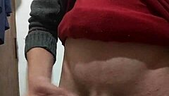 i'm jerking off with my clothes on, feeling the skinny cock in my hand as i masturbate alone.