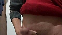 i'm jerking off with my clothes on, feeling the skinny cock in my hand as i masturbate alone.