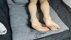 Look at this slim gay teen's beautiful feet in foot fetish video