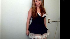 Watch that redheaded slut rip her clothes and tease her tits and ass