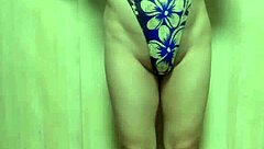 Beautiful amateur with a nice ass wears a gold leotard and gets anal training