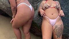 Watch us horny girls fucking on the beach in group lesbian action