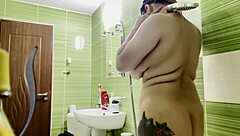 Solo play in the shower with huge cans and round ass