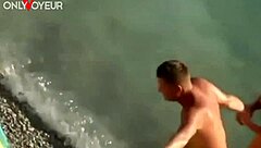 Nude beach swingers swap wives in a hot public foursome. Voyeurs can't look away!