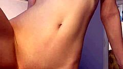 Petite teen 18+ reaches orgasm with dildo in tight pussy striptease solo session.