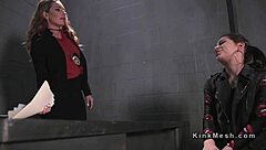 Lesbians in uniform punish an anal-loving prisoner in a femdom threesome