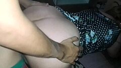 setting up tripod for doggystyle in bedroom with floral dress