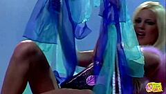 Blonde fingers herself to a vintage cowgirl strap-on ride