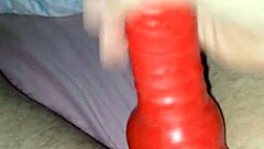 Amateur couple tries out latex costume during sex session
