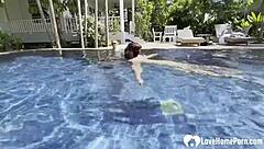 hot babe swims and teases cock poolside