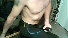 Stretching With Massage Gun With Compression Tights And Brace Bound