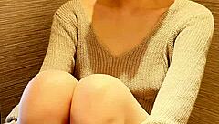 Brunette Japanese student in a mini skirt and boots
