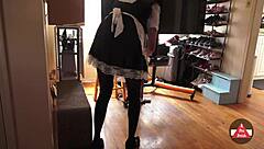 Maid in French costume cleaning the house and giving some hints