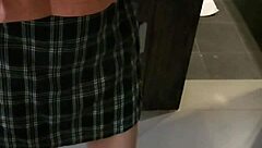 A ladyboy beauty practice her moves in front of the mirror