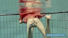 Katya Okuneva in her red dress, the erotic poolside experience of a Russian beauty