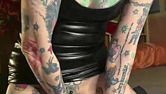 Hot milf’s great sex with a dildo and a tattoo on her back and a piercing on her nipple