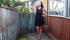 Amateur brunette MILF enjoys outdoor activities and wetting fetish