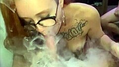 Redhead gets humiliated in smoking fetish group session