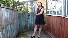 Watch the curvy milf smoking outdoors