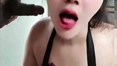 Nong New, a popular Thai student, gives a blow job and swallows cum in this amateur video