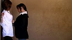 Two Brunettes Have Passionate Sex in Horse Stable