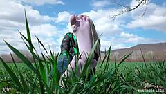 Cute toes in white socks on a spring grass field