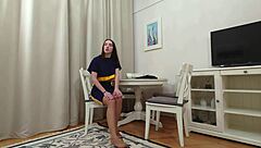 Evelyn trying on black and tan pantyhose and being a tease