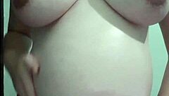 pregnant woman enjoys cream and massage session