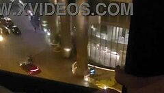 public masturbation tease at hotel window