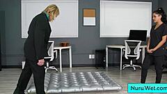 Nina White, ebony masseuse, gives wet nuru massage to Evan Stone