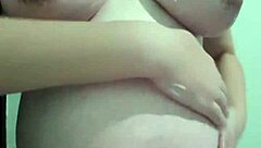 pregnant woman enjoys cream and massage session
