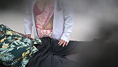 lady doctor chats playfully with patient in hospital setting