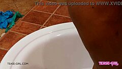 Dark-skinned beauty, a stunning model, indulges in solo pleasure