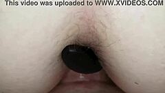 Doggystyle with anal plug in backside fucked