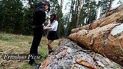 A girl is having sex with a guy in the forest, moaning with pleasure