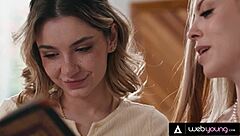 Redhead and petite blonde explore steamy lesbian passion