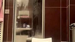 Babe in the shower, lost in sensual masturbation