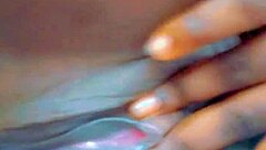 Feeling the creamy delight of her little pussy.