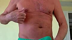 pervy papifacheros fat daddie felt the soft shorts on his boner and just had to spread his legs wide.