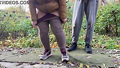 curvy milf squats in leggings outdoors