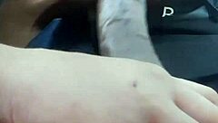 getting the car wet with shampoo in the parking lot during the rain storm with my friends watching