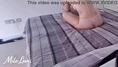 A cute girl in sexy underwear plays on the computer