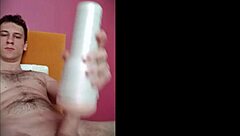 pretty boy uses toy to cum for first time on bed