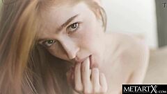 the natural redhead bent over, teasing her asshole while fingering her wet pussy.