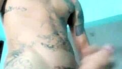 Skinny guy shows off his banana toy in the living room