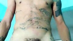 Skinny guy shows off his banana toy in the living room