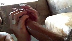 Mom gives handjob to big cock in bathtub