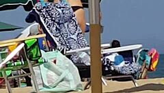 candid shots of this little 18+ slut's ass in a bikini at the beach, hidden from view