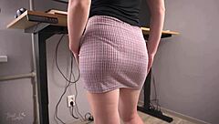 Milf secretary flaunts her tight skirt and teasing panty line at work