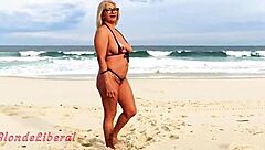 Exhibiting on the beach to strange guys in a micro bikini by the river